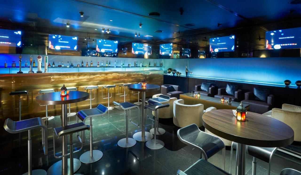 The Canvas Dubai - Mgallery Hotel Collection Exterior foto The interior of the bar